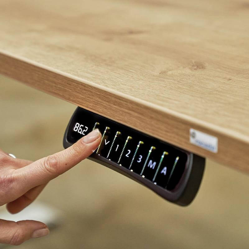 Mando escritorio ajustable en altura electrónicamente.