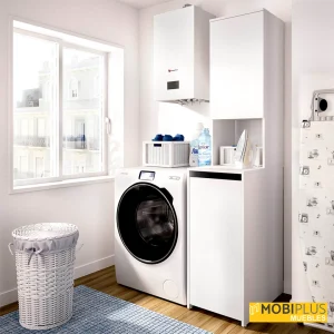 Mueble organizador auxiliar de lavandería en color blanco situado junto a la lavadora en una estancia luminosa.