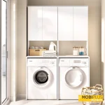 Mueble de lavadero doble blanco con lavadora y secadora integradas en un lavadero moderno.
