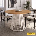 Mesa de comedor redonda Sahara de 120 cm con base marfil y tablero de roble natural.