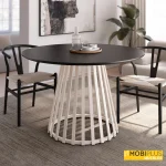 Mesa de comedor redonda Sahara de 120 cm con base marfil y tablero de roble negro.