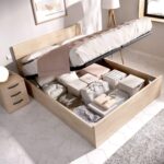 alt="Canapé con tapa somier modelo Vasa en color natural para dormitorio"
