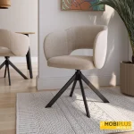 Silla de comedor giratoria Cork tapizada en tela marrón topo o beige con patas negras.