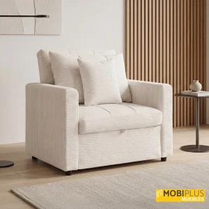 Sillón cama individual modelo Diván tapizado en pana de color crema o beige claro en un ambiente moderno.